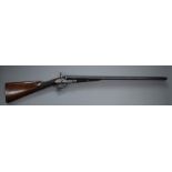 James Kerr of London 12 bore side by side hammer action shotgun with finely engraved locks,