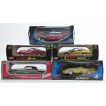 Five 1:18 scale diecast model cars comprising three Anson Ford Thunderbird, Ferrari Dino 246GT and