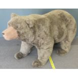 A life size freestanding Teddy bear, 220cm long.