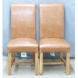 A pair of upholstered oak chairs, new and unused