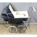 Silver Cross coach built doll's pram with doll, H77cm