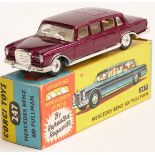 Corgi Toys diecast model Mercedes Benz 600 Pullman with maroon body, cream interior and operating