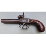 Double barrelled side by side percussion hammer action pistol with carved wooden grip shaped hammers