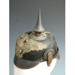 German pickelhaube helmet with "Mit Gott Fur Koenig Und Vaterland" to helmet plate, part liner and