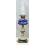 Wright & Butler oil lamp with blue glass reservoir, Height 68cm