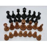 Staunton wooden part chess set with impressed red crown mark, height of king 11cm, 29 pieces.
