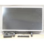 Sony flatscreen television, stand and accessories
