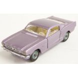 Corgi Toys diecast model Ford Mustang Fastback 2+2 with silver body, cream interior and Corgi on