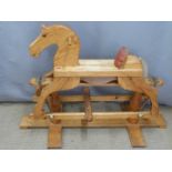 A wooden rocking horse, H75cm