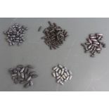 A collection of five types of lead bullets suitable for re-loading including .45, .312, Sharps etc.
