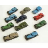 Eleven Dinky Toys diecast model cars including Triumph, Riley, Bentley etc, some pre-war.