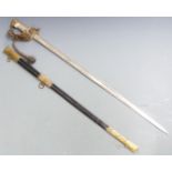 Royal Navy 827 pattern sword with fouled anchor motif to folding guard, lion head pommel guard,