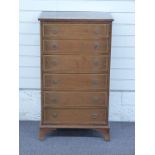 Mahogany chest of six drawers with inlaid decoration and ring handles, raised on bracket feet, W58 x