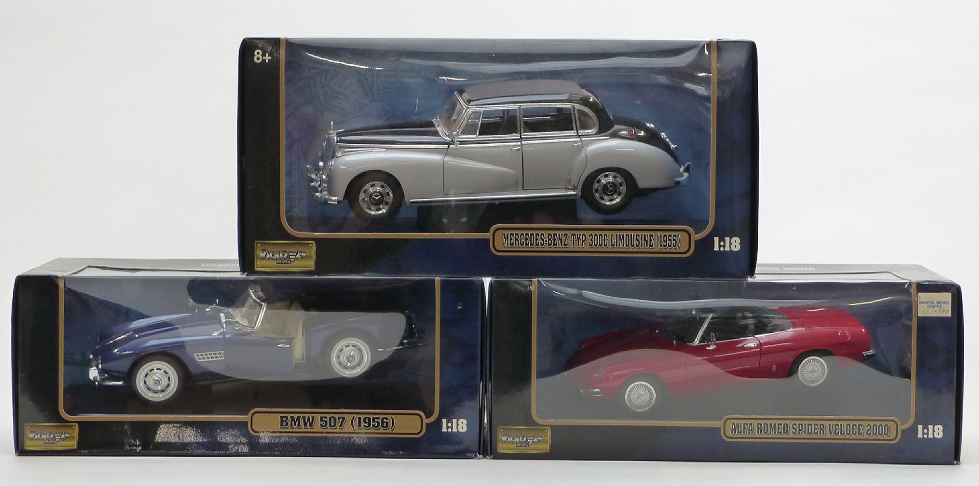 Three Ricko Ricko 1:18 scale diecast model vehicles comprising Alfa Romeo Spider Veloce 2000