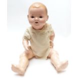 Heinrich Handwerke composite doll with open mouth, weighted brown eyes and jointed limbs, marked