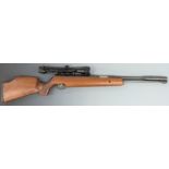 Weihrauch HW97K .22 air rifle with chequered semi-pistol grip, raised cheek piece, adjustable gilt