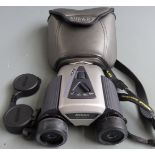 Pair of Nikon 8-24x25 zoom binoculars in soft case