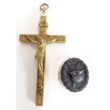 German WW1 brass and wood crucifix, H13cm, together with a metal mound badge