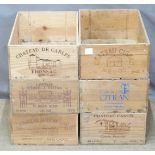 Six vintage wooden wine crates from various chateaux including  Cissac, Citran, Canon, De Carles,