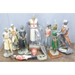 A collection of model knight figures, tallest 37cm