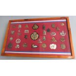 Thirty one mainly British Army badges including Northamptonshire Yeomanry, Royal West Kent, Scots