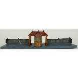 Bing 0 gauge tinplate train station stamped Germany and with maker's mark to the base, 40cm long.