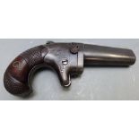 Colt No. 2 .41 rimfire derringer pistol with shaped and chequered grip, engraved decoration,