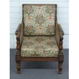 A 19th/20thC bergere upholstered armchair with leather armrest and Liberty style fabric, W70 x D85 x