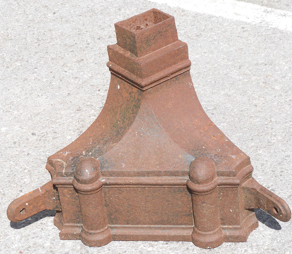 A large cast iron corner rainwater hopper / planter, W60 x H45cm