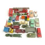 Twenty-five Corgi, Dinky, Matchbox and similar diecast model vehicles including military trucks,