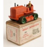 Dinky Supertoys diecast model Heavy Tractor with orange body, green tracks and beige driver, 563, in