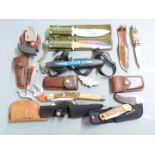 Fourteen hunting and skinning knives including Remington, Browning and an Inox diver's knife