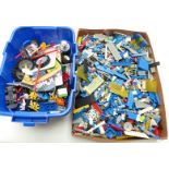 Over 3kg of loose Lego comprising mainly blue and white pieces together with a box of K'nex.