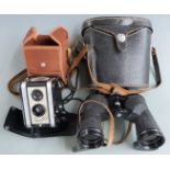 Kodak Duaflex camera in canvas pouch and a pair of binoculars