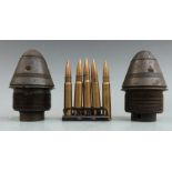 Two WWI ordnance fuses together with a clip of five practice .303 rounds