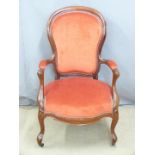 Spoonback upholstered armchair and a shieldback dining chair