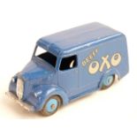 Dinky Toys diecast model OXO Trojan van with 'Beefy OXO' decals, dark blue body and light blue hubs,