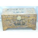 A mid-20thC Eastern carved camphorwood chest with lift out tray, Hong Kong label within, W89 x D42 x