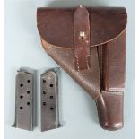 Walther PP brown leather pistol holster stamped to the inside together with two Walther PP