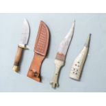 Browning 4518 hunting knife with 11cm blade, in leather sheath and a Middle Eastern tribal knife and