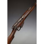 Deactivated Long Lee Enfield bolt-action rifle with bolt shield, mag lever, brass butt plate with
