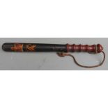 Painted Victorian truncheon with Royal cipher and E55 stamped under crown, with leather wrist strap,