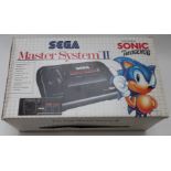 Sega Master System II Sonic The Hedgehog video games console, in original box.