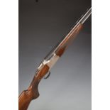 Winchester 5000 Field 12 bore over and under shotgun with engraved locks and trigger guard, single