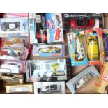 Eighteen New Ray, Dickie, Lledo and similar diecast model vehicles including Disney Pixar Cars,
