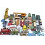 Thirty-four Corgi and Dinky Toys diecast model vehicles including Batmobile, Kodak Cameras Bedford