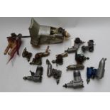 Twelve OS glow ignition model aircraft engines to include LA40, 25, 61, 30 and Max FP 25