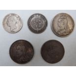 A small collection of George III and Victorian silver to include three crowns and two half crowns