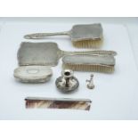 Elizabeth II hallmarked silver dressing table set with floral embossed decoration, comprising hand