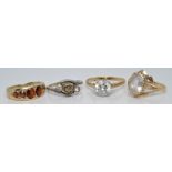 Three 9ct gold rings and a 9ct gold and silver ring